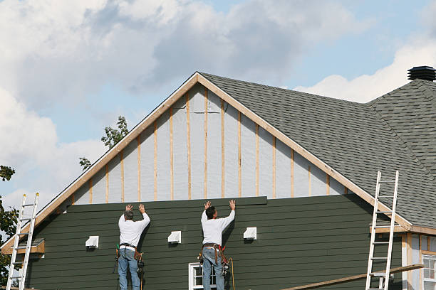 Professional Siding technician working in Dublin, GA